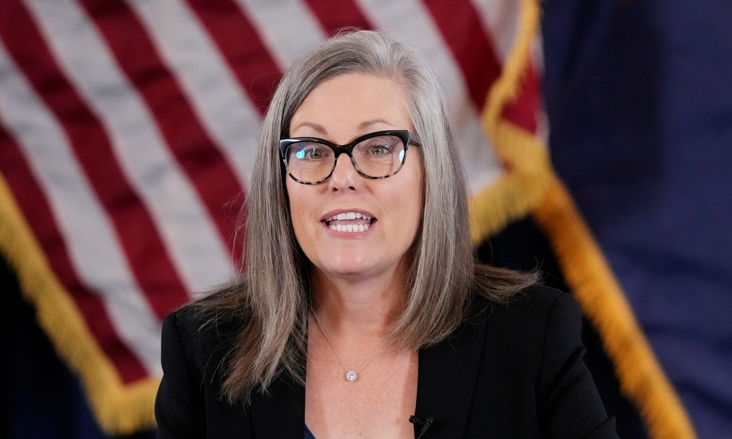 Arizona Democrat governor-elect and current Arizona Secretary of State Katie Hobbs speaks prior to certifying the Arizona general election canvass in a ceremony at the Arizona Capitol in Phoenix, Monday, Dec. 5, 2022. (AP Photo/Ross D. Franklin, Pool)