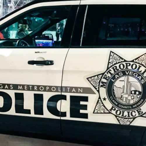 Las Vegas, Nevada, USA - February 2019: Close up view of the side of a police patrol vehicle of the Las Vegas Metropolitan Police at night.